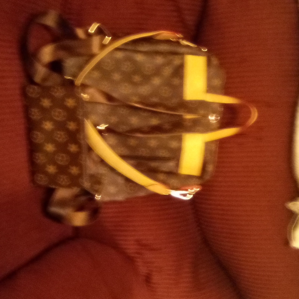 Leather backpack bag with clucth inside . multiple carrying straps